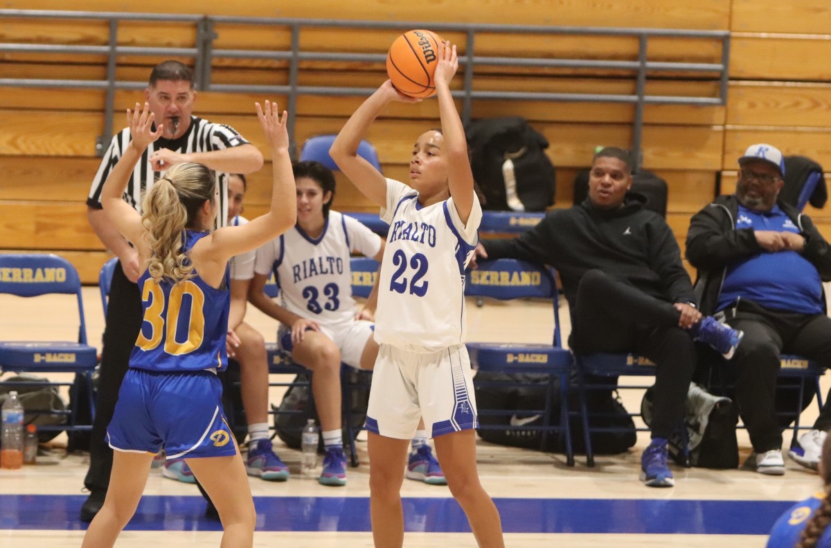 Not only is Davis (22) a big-time scorer, but she averages 5.1 assists per game. 